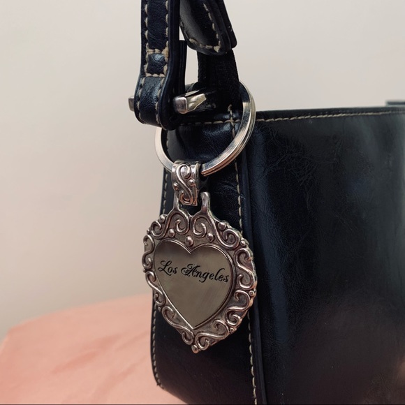Beautiful black leather bag with elegant charm - Picture 3 of 5